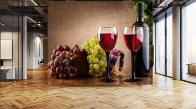 Glasses of red wine and bottle Wall mural