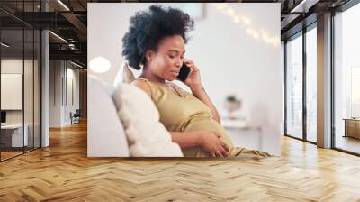 Pregnant, phone call and black woman in home, talking or chatting to contact on living room sofa. Technology, pregnancy or future mom with mobile smartphone for networking, conversation or discussion Wall mural