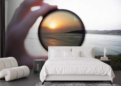 The beach through the glass of a lens filter Wall mural