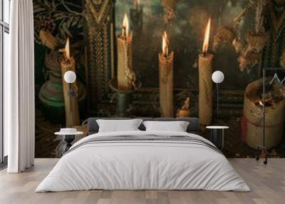 Candle burns on the altar, powerful magic among candles, pagan or wicca concept Wall mural