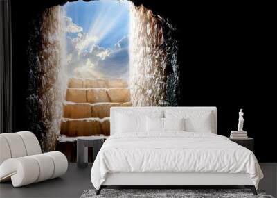 Easter resurrection background, with empty stone tomb and light rays from the clouds Wall mural