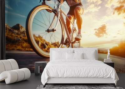 A cyclist's strong legs pedaling uphill, embodying the concept of Olympic-level strength and endurance in summer. Wall mural