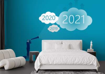 Businessman looking for opportunities in spyglass on 2021 year the target on cloud vector Wall mural