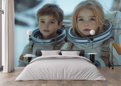 Two young children in space suits standing side by side, ready for their interstellar journey. Wall mural