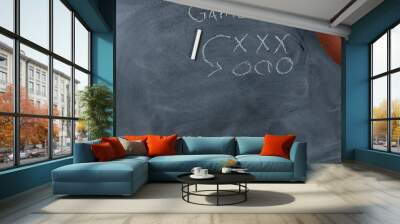 American football with game plan on chalkboard setting for strategy  Wall mural