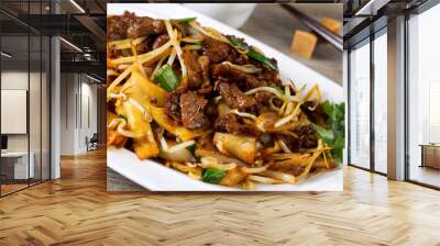 Chinese spicy beef and vegetable dish in plate  Wall mural