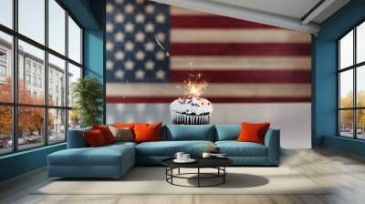 Glowing sparkler inside cupcake with rustic wooden flag of United States of America in background Wall mural