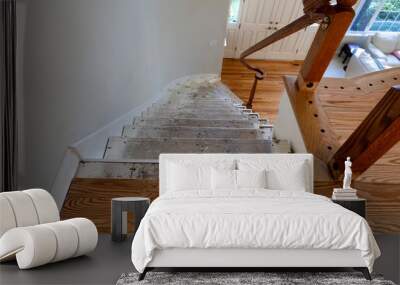 Renovation of home staircase with exposed plywood and red oak wooden boards Wall mural