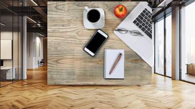 Tidy workspace with red apple and coffee for break Wall mural