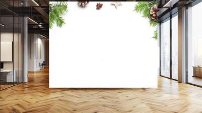 Christmas festive styled stock image. Floral frame composition with pine cones, fir tree branches, wooden and anise stars on white wooden background. Flat lay, top view with empty copy space. Wall mural