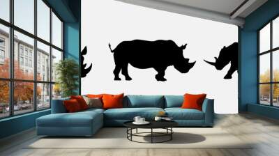 isolated black silhouette of a rhinoceros , vector collection Wall mural