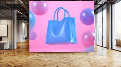 Colorful blue shopping bag on a pink background with floating spheres, representing modern retail and vibrant fashion trends. Wall mural