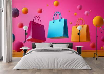 Colorful shopping bags floating in a vibrant pink background with various colored spheres, representing fun and excitement in shopping. Wall mural