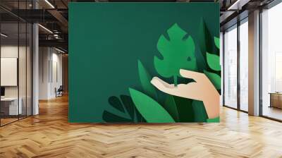 Eco-friendly illustration of a hand holding a green leaf, representing environmental conservation and sustainability Wall mural