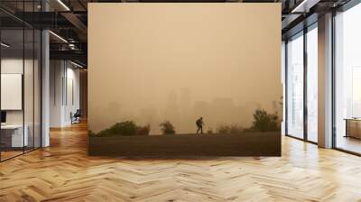 An orange smoke-filled sky is seen above Portland's downtown skyline during the Oregon wildfires. Wall mural