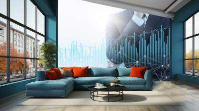 businessperson thinking about technology and growth. businessperson in blue suit, growth graphs and  Wall mural