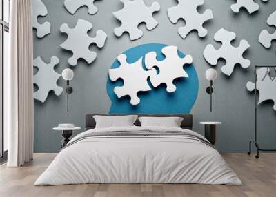 Intellectual mind image. Connecting two jigsaw puzzle pieces. Blue person head silhouette. Wall mural