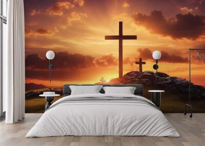 A wooden cross on a hill at sunset Wall mural