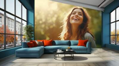 Overjoyed happy woman enjoying the green beautiful nature woods forest around her - concept of female people and healthy natural lifestyle - happiness emotion and adult lady opening arms Wall mural