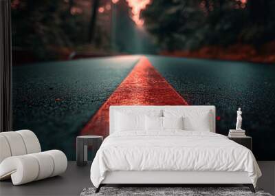 Misty Road With Red Line Cutting Through Dense Forest At Dusk Wall mural