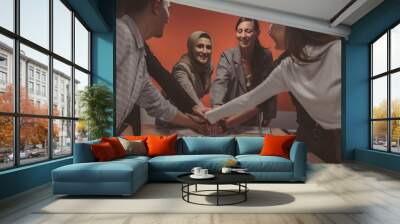 Celebrate International business office meeting group. Cheerful business company team start conference with good teamwork, work in a workplace. Office employee team project smile in a convention room. Wall mural