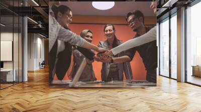 Success International business office meeting group. Cheerful organization team start conference with good support company empower. The office employee team celebrates a project in a convention room Wall mural