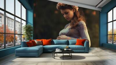 Beautiful pregnant girl expecting a baby with a round belly Wall mural