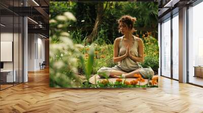 Woman doing yoga and meditation in the park Wall mural