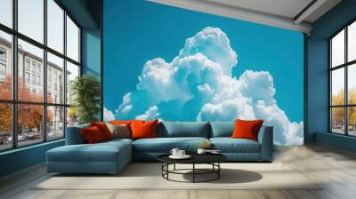 Dramatic White Clouds Against a Vibrant Blue Sky Wall mural