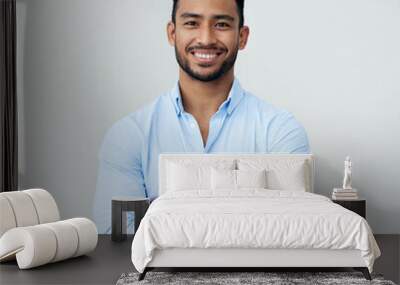 Economist, portrait and business man with arms crossed in studio isolated on a white background. Face, confidence and happy Asian male professional, entrepreneur or analyst from Singapore with mockup Wall mural