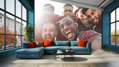 Football team, portrait and selfie on sports field with happiness, pride and final competition. Men, diversity and professional sport with collaboration in teamwork, lens flare and champion close up Wall mural