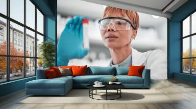 Woman, scientist and blood sample in lab, thinking and analysis with ppe glasses, safety and test. Science, pathology and expert with ideas, inspection or check for medical research in laboratory Wall mural