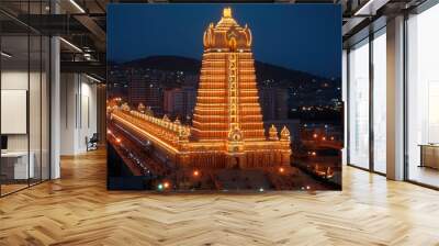 Illuminated Hindu Temple at Night with Cityscape in Background Wall mural