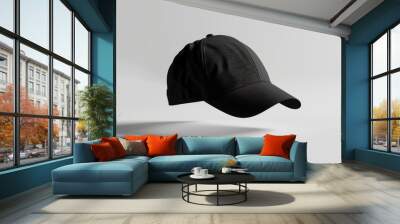 Minimalist black baseball cap floating on a white background Wall mural