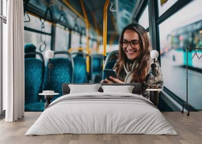 Photo a person using smartphone on the bus Wall mural