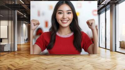 Smiling Woman with Fists Raised in Red Shirt Wall mural