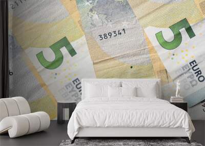 Five euro banknotes as a background close up Wall mural