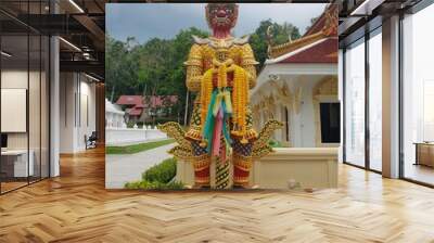 golden Giant buddha statue in thailand. Buddhism temple Wall mural