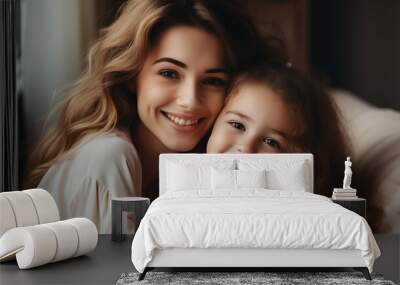 happy mother and daughter hugging and smiling at camera Wall mural