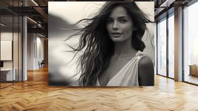 Portrait of beautiful young woman on the beach. Black and white photo. Wall mural