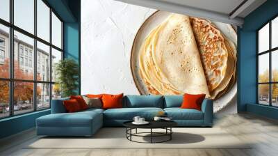 Stack of freshly made crepes on a plate Wall mural