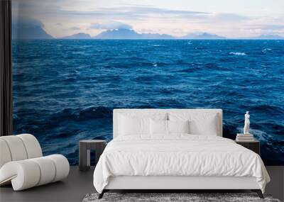 Lofoten, Norway. The beautiful dramatic  waves sea view and cloudy sky in Lofoten. Wall mural