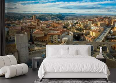 Aerial panoramic view of Teruel Spain with medieval city walls, viaduct, aquaduct and semi circular tower on a sunny winter afternoon  Wall mural