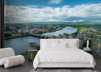 Aerial view of Limerick city and King John's castle on King's Island with concentric walls and round towers along the Shannon river and Thomond bridge Wall mural