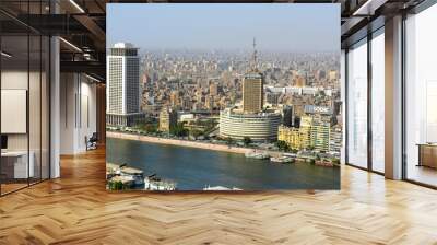 Aerial view of Cairo city skyline at the river Nile bank with Egyptian Radio and Television building on the right and ministry of foreign affairs building on the left Wall mural