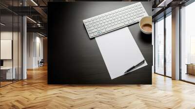 A cup of coffee, a white PC keyboard, a piece of white paper and a ballpoint pen on a wooden table. Wall mural