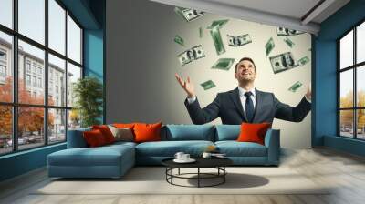 A man who makes a lot of money, a lot of paper dollars flying around. Wall mural