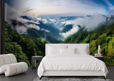 scenic lush green tropical landscape panorama with low clouds in the mountains of arunachal pradesh india Wall mural