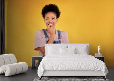 Nervous, black woman and biting nails in studio with oops reaction to gossip on yellow background. Mistake, sorry and female overwhelmed by fake news, drama or secret with regret, shame or awkward Wall mural