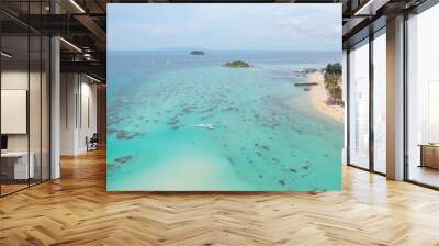 Aerial view of clear blue turquoise seawater, Andaman sea in Phuket island in summer season, Thailand. Water in ocean pattern texture wallpaper background. Wall mural